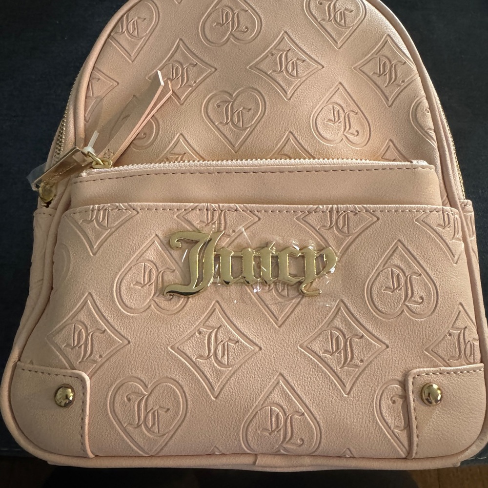 Juicy Couture Pale Pink Embossed Mini Backpack with Gold Logo